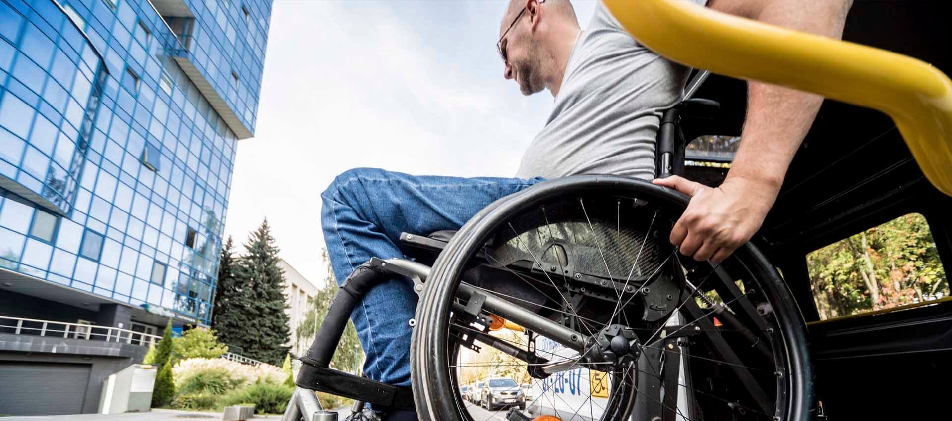 Close up angle of wheelchair from bottom up. 