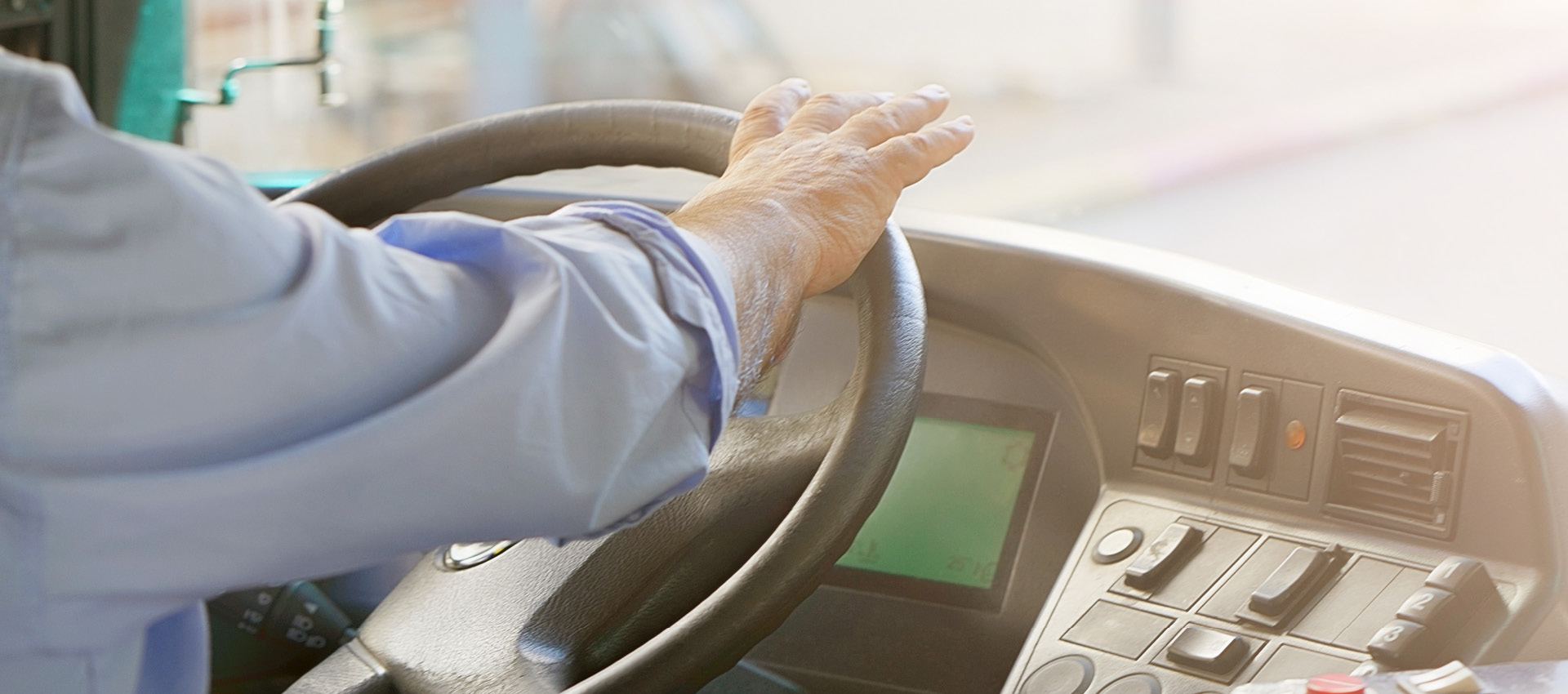 Inside view of driving a bus.